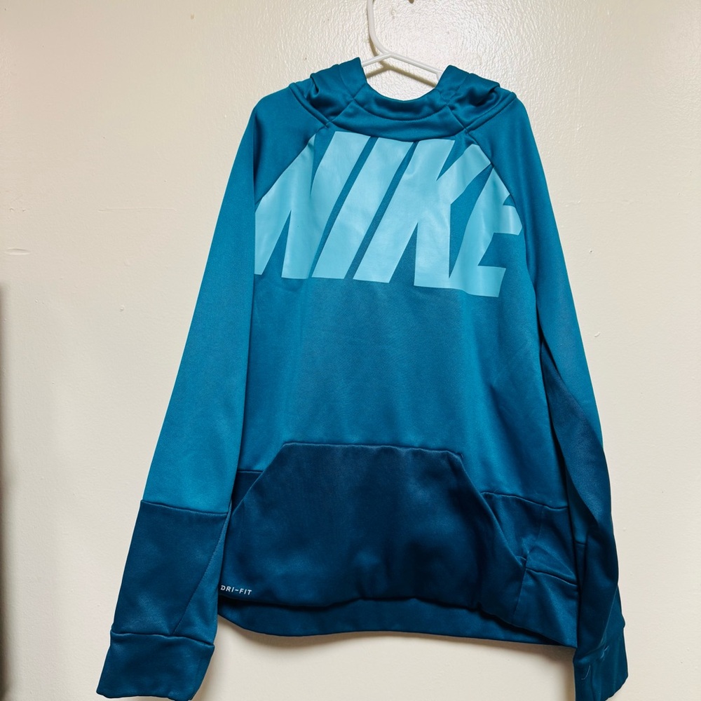 Nike Blue Pullover with Logo
This is a Nike Dri-FIT pullover hoodie in a blue